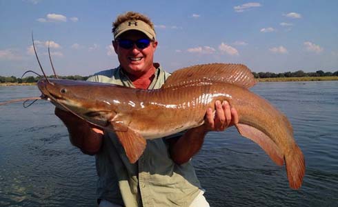 Steve Townson of Africa-Angler.com with a Zambezi River vundu catfish