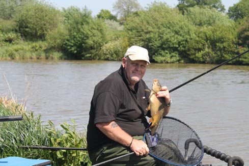 Mick Wilkinson with a carp from his 223lb bag