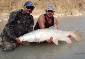 Chris with one of the biggest Indian mahseer caught for years. 