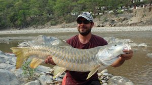 Finally a beautiful golden mahseer on a lure.